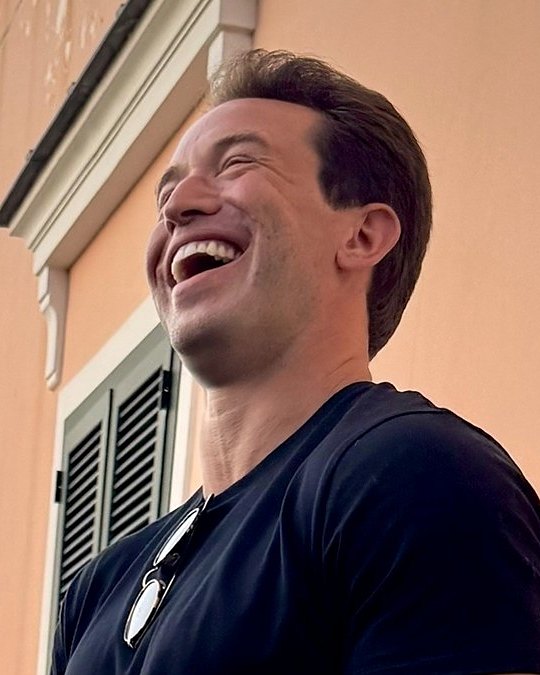 Michael Hewitt laughing